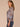 Lavender Grey Multi Shirred Three Quarter Dolman Sleeve Scalloped Scoop Neck Shimmery Abstract Placement Print Shirttail Hem Knit Top