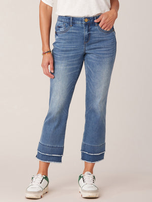 
            
                Load image into Gallery viewer, Mid Blue Denim Absolution Mid Rise Repreve Split Double Layer Fray Kick Flare Hem Jean
            
        