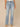 Light Blue Denim Absolution High Rise Slightly Arched Back Yoke Subtle Destruction Out There Flare Jean