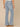 Light Blue Denim Absolution High Rise Slightly Arched Back Yoke Subtle Destruction Petite Out There Flare Jean