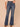 Blue Denim Absolution High Rise Slightly Arched Back Yoke Subtle Destruction Out There Flare Jean
