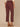 Cherry Chocolate Absolution High Rise Angled Dart Seams Arched Front Pockets Back Buckle Snap Hem Tapered Utility Pant
