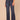 Indigo Denim Absolution Skyrise Slightly Arched Back Yoke Trouser Front Flap Back Pockets Double Side Seam Trouser Detail Bootcut Jean