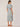 Island Sky Smokey Landender Short Bell Sleeve Ruffle Shoulder Button Down Front Ruffle Edge Stand Collar Abstract Print Smocked Waist Self Tie Midi Woven Dress