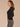 Black Long Sleeve Mock Neck Pointelle Stitch Shirttail Hem Sweater
