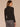 Black Long Sleeve Mock Neck Pointelle Stitch Shirttail Hem Sweater

