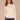 Winter White Long Sleeve Mock Neck Pointelle Stitch Shirttail Hem Sweater
