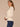 Winter White Long Sleeve Mock Neck Pointelle Stitch Shirttail Hem Petite Sweater
