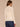 Winter White Long Sleeve Mock Neck Pointelle Stitch Shirttail Hem Petite Sweater

