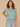 Aqua Haze Extended Origami Cap Sleeve Scoop Neck Metallic Stripe Cased Hem Knit Top
