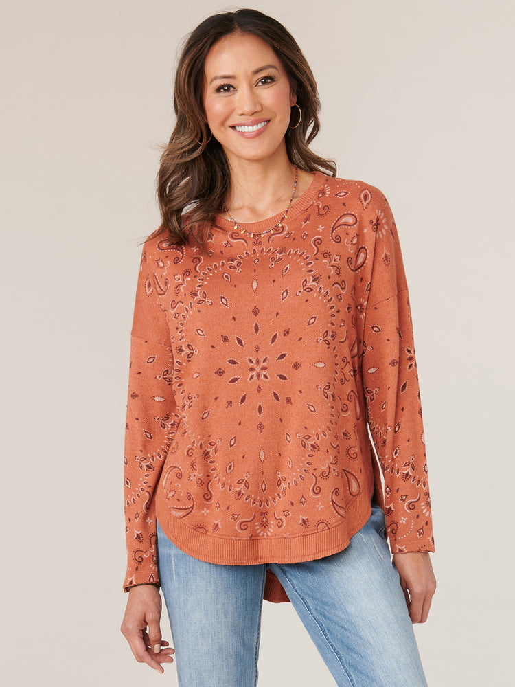 
            
                Load image into Gallery viewer, Ginger Spice Paisley Long Sleeve Boatneck Shirtail Hem Print Knit Top
            
        