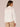 Off White Three Quarter Smocked Sleeve Collar Neck Cascading Scallop Edge Ruffle Button Down Front Embroidery Mixed Media Hi-Low Petite Woven Shirt