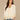 Off White Natural Three Quarter Cinched Blouson Puff Sleeve Open Front Round Neck Crochet Framing Edge Cropped Hem Woven Jacket