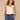 Off White Black Sleeveless Sweetheart Neck Shell Tuck Embroidery Surplus Shirttail Hem Knit Top
