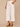 Optic White Denim Absolution Skyrise Angled Dart Seams Four Pocket Patch Back Pockets Cropped Tulip Hem Wide Leg Jean