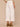 Optic White Denim Absolution Skyrise Angled Dart Seams Four Pocket Patch Back Pockets Cropped Tulip Hem Wide Leg Jean