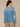 Light Blue Artisanal Denim Long Drop Shoulder Sleeve Elongated Contrast Collar Zip Front Inverted Back Pleat Studded Pocket Hi-Low Hem Jacket
