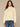 French Vanilla Long Banded Blouson Dolman Sleeve Cown Tie Neck Seaming Mixed Media Knit Top
