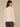 Ecru Long Sleeve Drapey Boat Neck Shirttail Hem Knit Top

