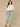 Bleached Blue Below Elbow Puff Ruffle Cuff Sleeve Round Collar Neck Button Down Pleated Placket Edge Stitch Hi-Low Lyocell Denim Top