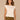 Off White Extended Cap Sleeve Embroidered Scoop Neck Pleated Peplum Hem Knit Top