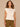 Off White Extended Cap Sleeve Embroidered Scoop Neck Pleated Peplum Hem Knit Top