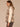 Walnut Shadow Plaid Sleeveless Funnel Neck Zip Front Toggle Waist Ties Breast Pockets Side Entry Pockets Shirttail Hem Plaid Woven Faux Fur Lined Vest