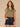 Lily Pad Multi Crochet Cap Sleeve Notched V-Neck Shirttail Hem Knit Top
