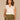 Off White Multi Crochet Cap Sleeve Notched V-Neck Shirttail Hem Knit Top
