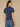 Heather Midnight Short Sleeve Scallop V-Neck Front Center Seam Ruched Side Twist Hi-Low Hem Knit Top
