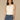 Off White Sleeveless Scoop Neck Asymmetrical Shirred Front Seaming Knit Top