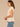 Soft Linen Short Sleeve Ruffle Stand Collar Split Neck Embroidered Netting Detail Shirttail Hem Petite Woven Top
