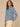 Light Blue Denim Long Sleeve Collar Neck Hidden Snap Front Waistband Tie Seaming Curved Peplum Hem Slits Petite Denim Jacket
