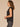 Black Ruffle Cap Sleeve Ruffle Stand Collar Notch Neck Tie Back Pleat Shirttail Hem Knit Top
