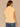 Peach Puree Extended Short Sleeve Rounded Ruffle Collar Neck Button Down Front Straight Back Yoke Textured Dot Hi-Low Shirttail Hem Woven Top