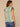 Cream Teal Multi Flutter Cap Sleeve Split V-Neck Pleated Pintuck Front Back Center Seam Shirttail Hem Abstract Placement Border Print Woven Top