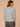 Heather Nile Blue Three Quarter Dolman Batwing Sleeve Crew Neck Mixed Media Shirttail Hem Knit Top