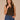 Black Camel Sleeveless Cowl Neck Zip Back Abstract Animal Print Slit Shirttail Hem Woven Top