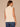 Ecru Off White Sleeveless Cowl Neck Zip Back Abstract Animal Print Slit Shirttail Hem Woven Top