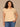 Peach Puree Extended Short Sleeve Rounded Ruffle Collar Neck Button Down Front Straight Back Yoke Textured Dot Hi-Low Shirttail Hem Plus Size Woven Top