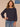 Heather Carbon Blue Long Ribbed Raglan Blouson Sleeve Scoop Neck Embroidered Detail Surplus Shirttail Hem Mixed Media Plus Size Knit Top