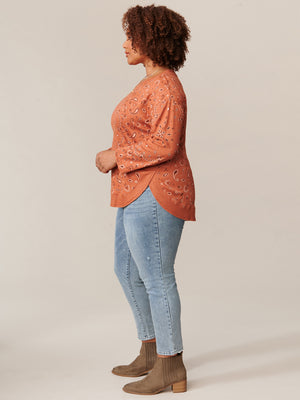 
            
                Load image into Gallery viewer, Ginger Spice Paisley Long Sleeve Boatneck Shirtail Hem Print Knit Plus Size Top
            
        