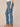 Mid Blue Denim Absolution Mid-Rise Double Side Seam Angled Pocket Detail Fading Whiskering Itty Bitty Boot Plus Size Jean