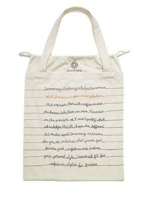 
            
                Load image into Gallery viewer, Democracy Script Natural Off White Drawstring Canvas Tote Bag
            
        